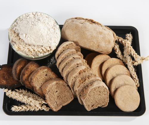tray with biscuits, toast, and bread